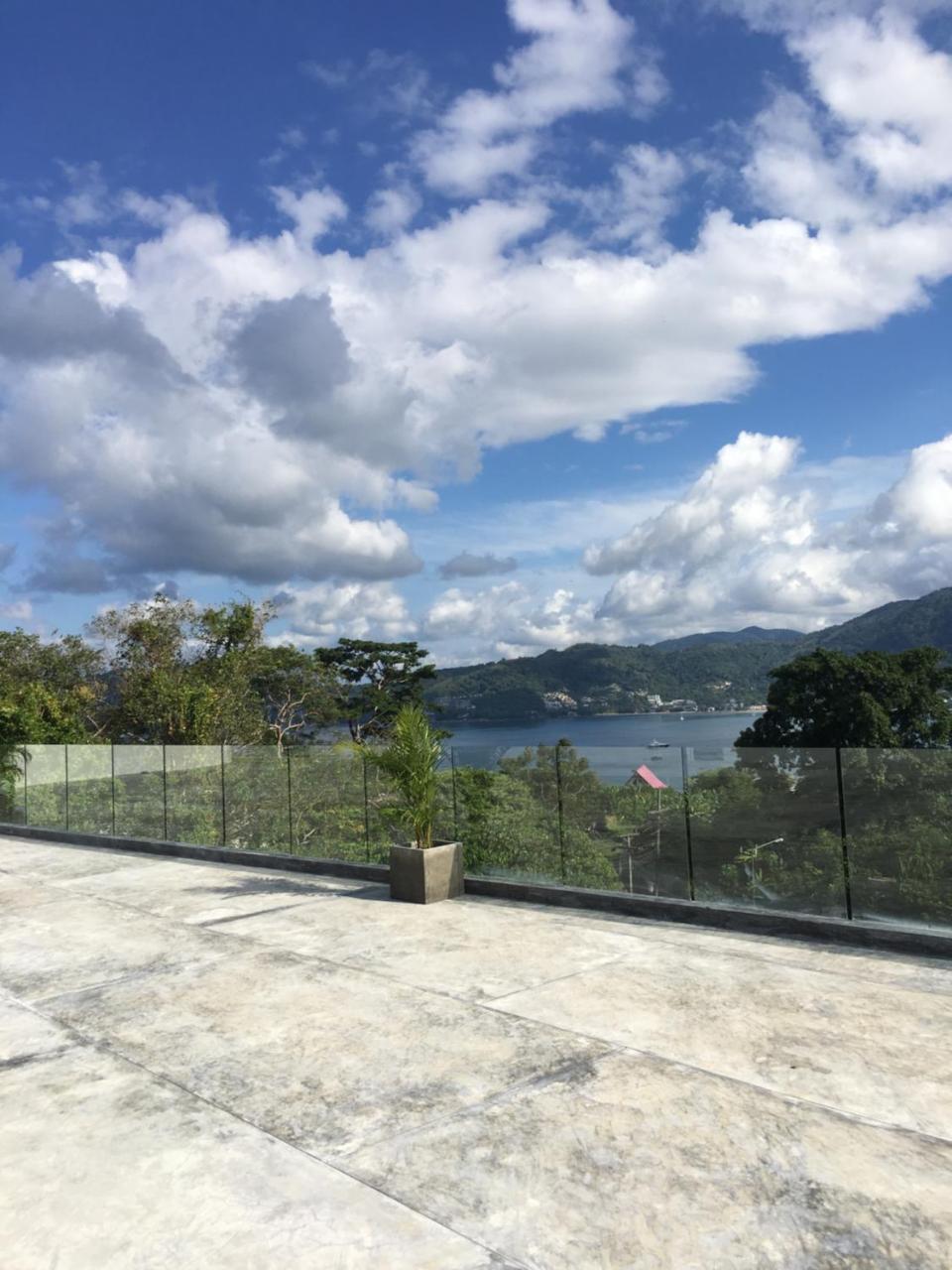 Patong Heights Hotel Buitenkant foto View of the lake from the hotel